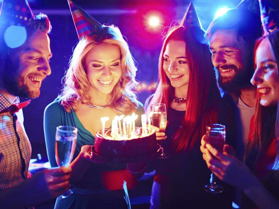 Birthday party with adults wearing hats