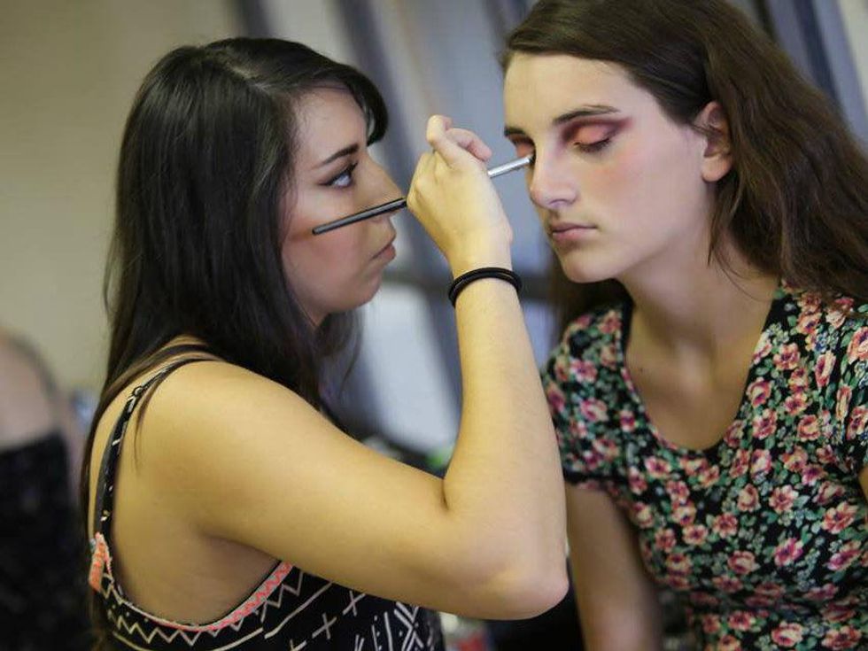 Blownaway stylist doing makeup