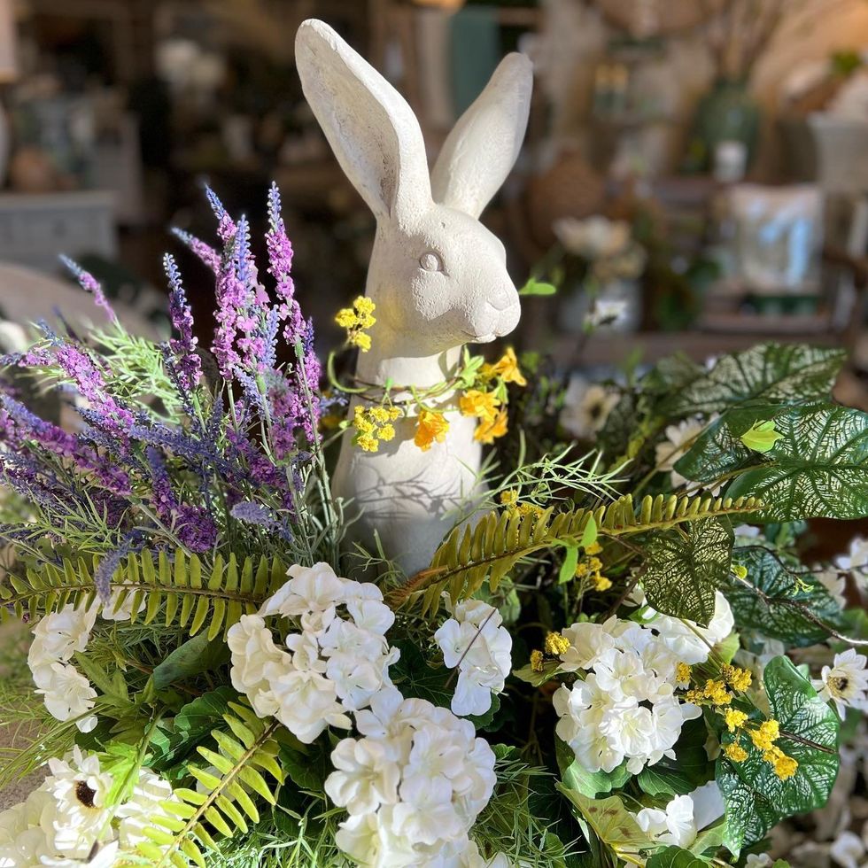 Bunny sculpture and flowers