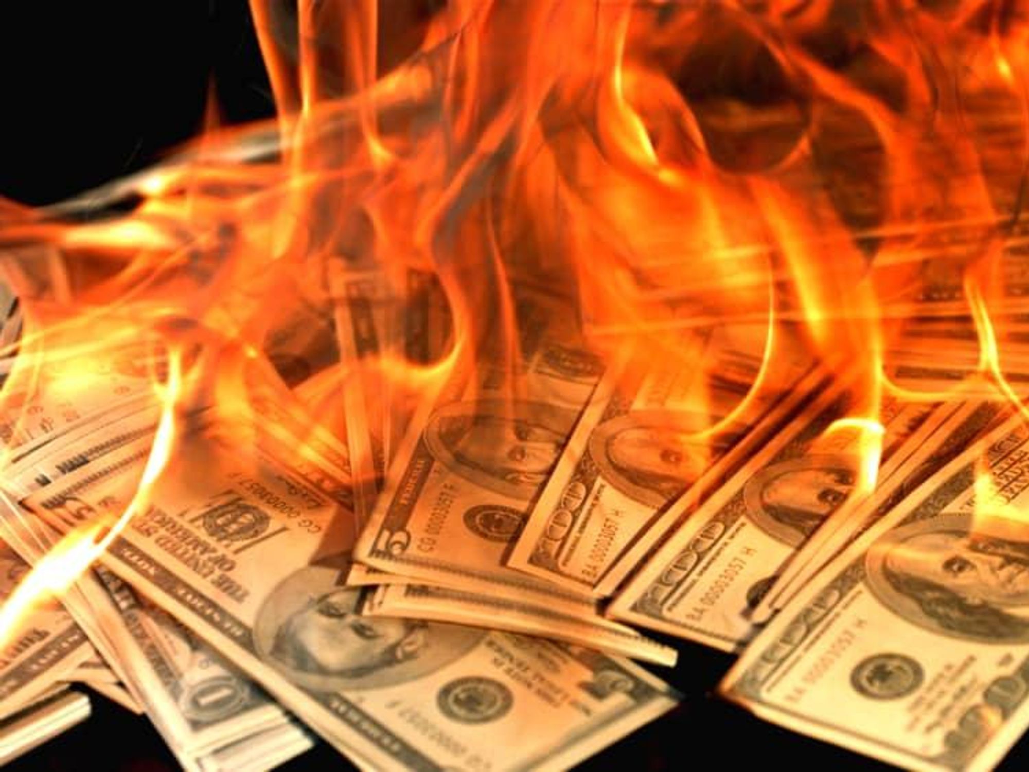 burning money 100 hundred dollar bills