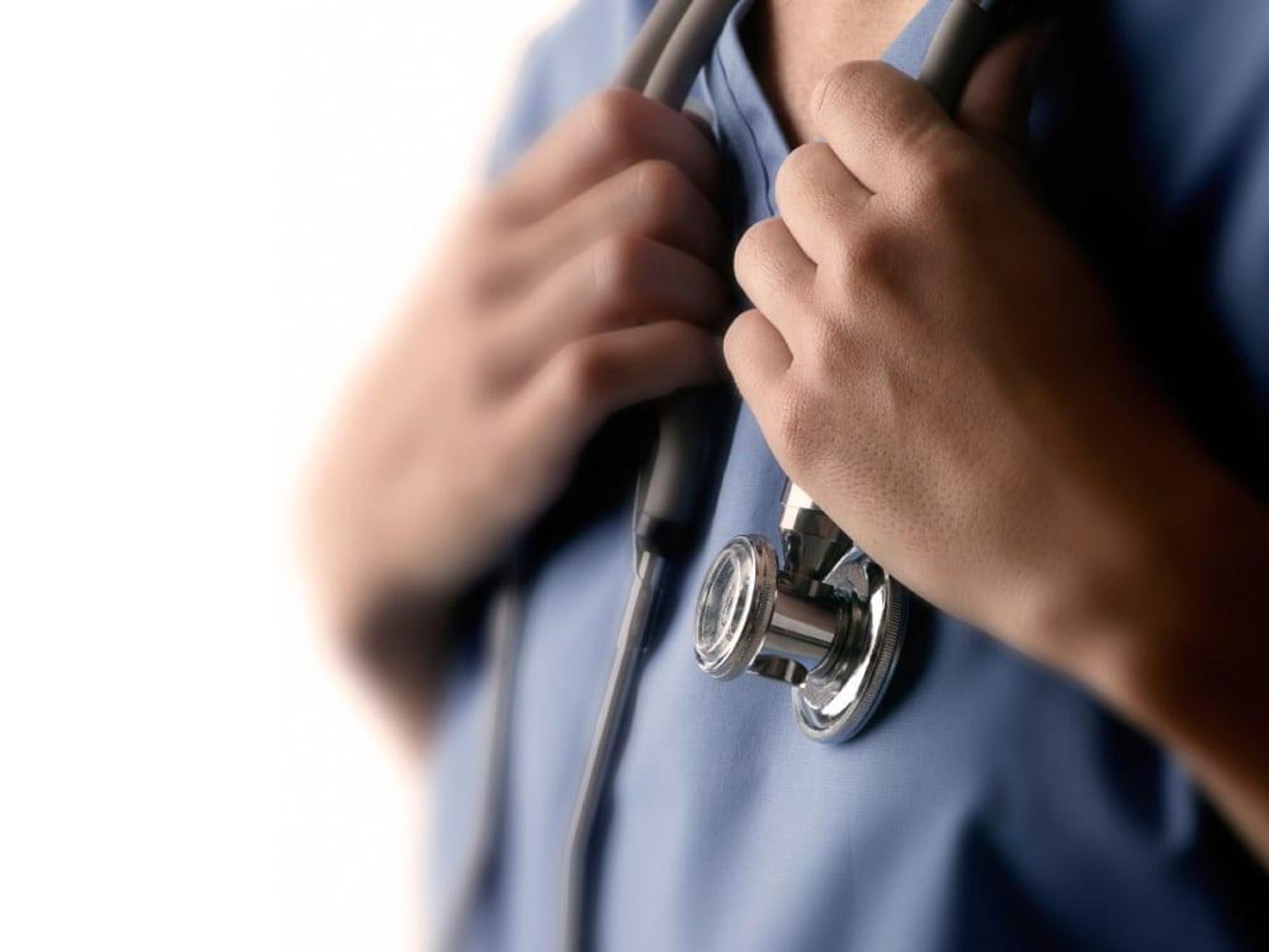 doctor holding stethoscope