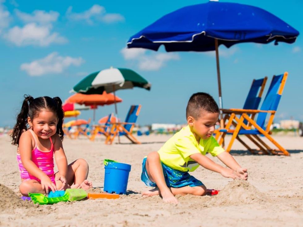 Galveston Stewart Beach kids playing in sand