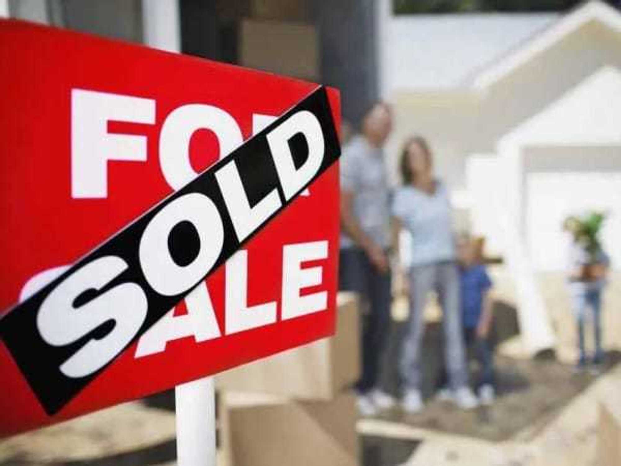 House for sale sold sign