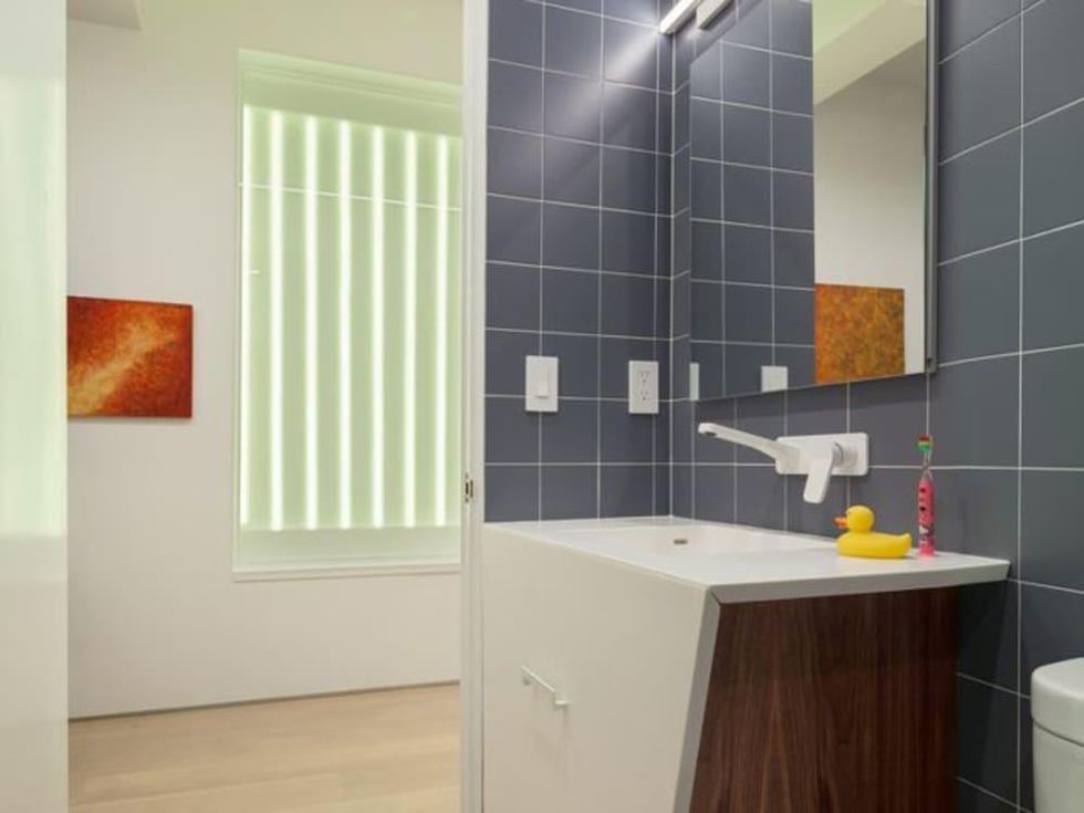 Houzz bathroom with wood vanity