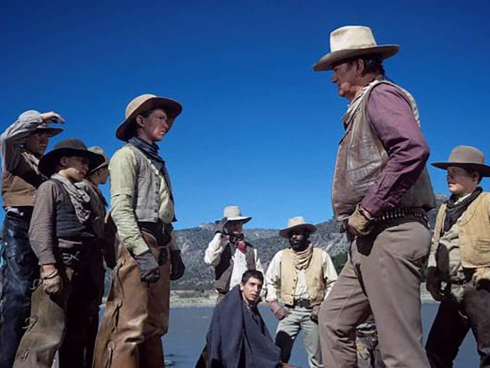 John Wayne and cast of The Cowboys