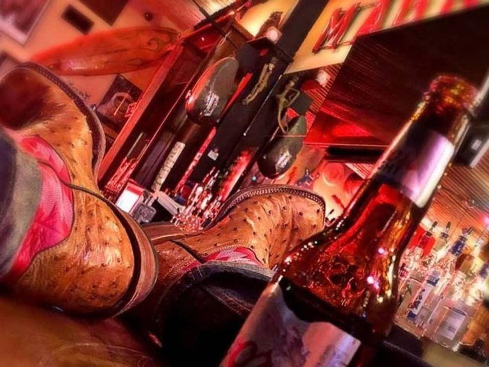 Magnolia Motor Lounge, boots on bar