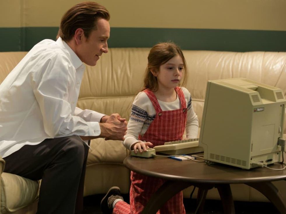 Michael Fassbender and Makenzie Moss in Steve Jobs