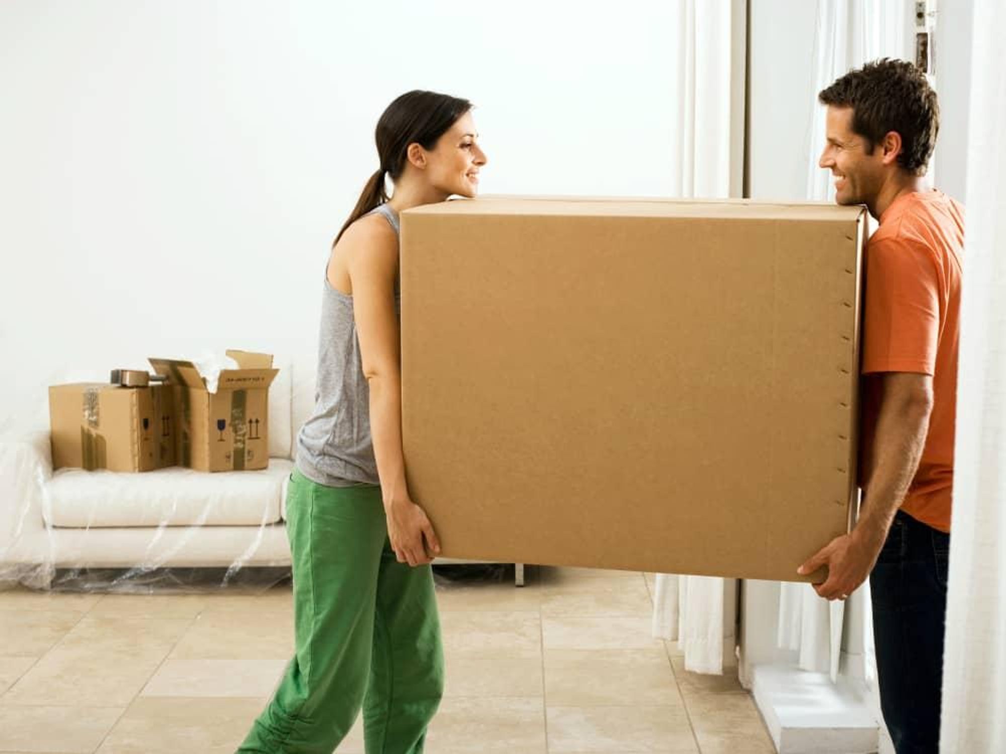 Moving day house boxes couple roommate