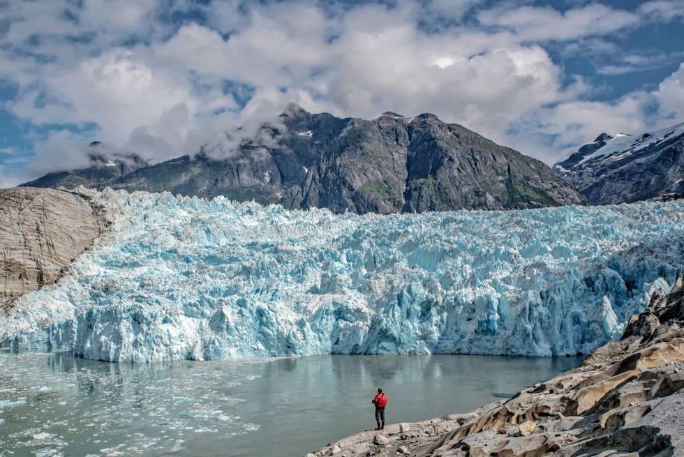 Person looking at a glacier