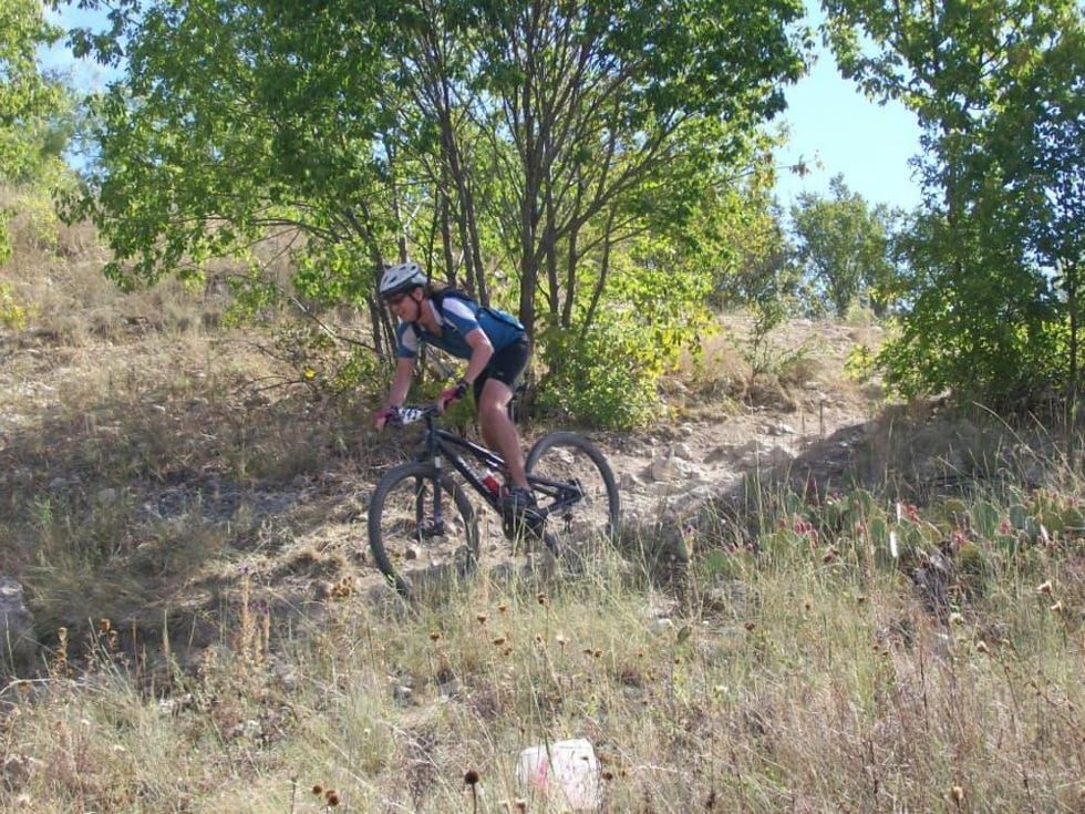 Person riding a bike through Marion Sansom Park