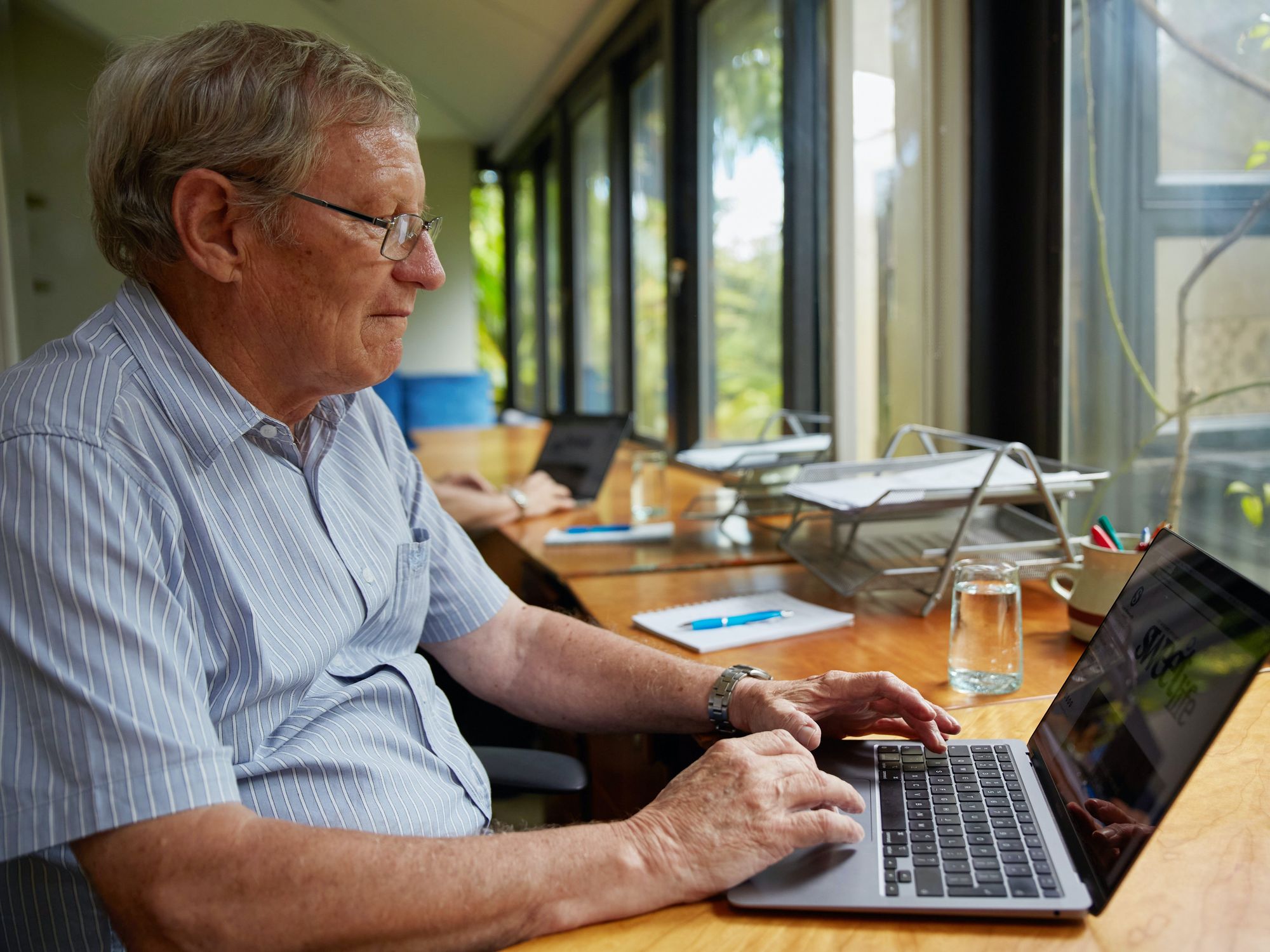 Senior citizen working from home