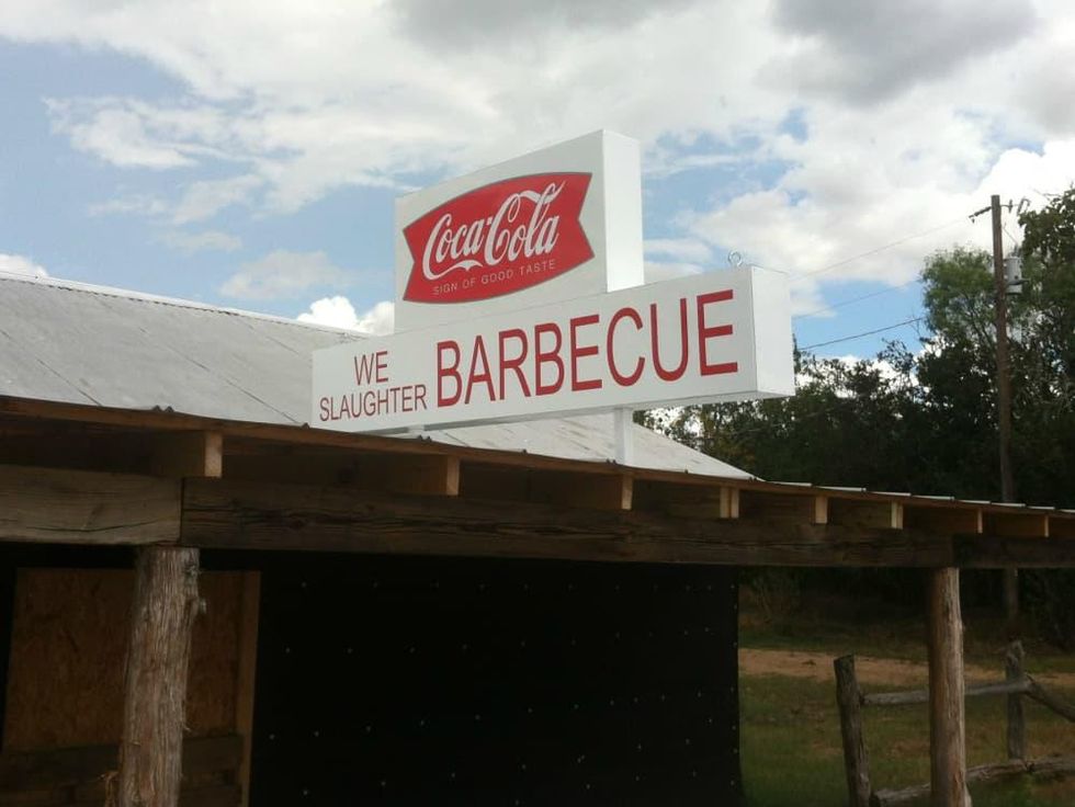 Texas Chain Saw Massacre Gas Station We Slaughter Barbecue restaurant resort sign