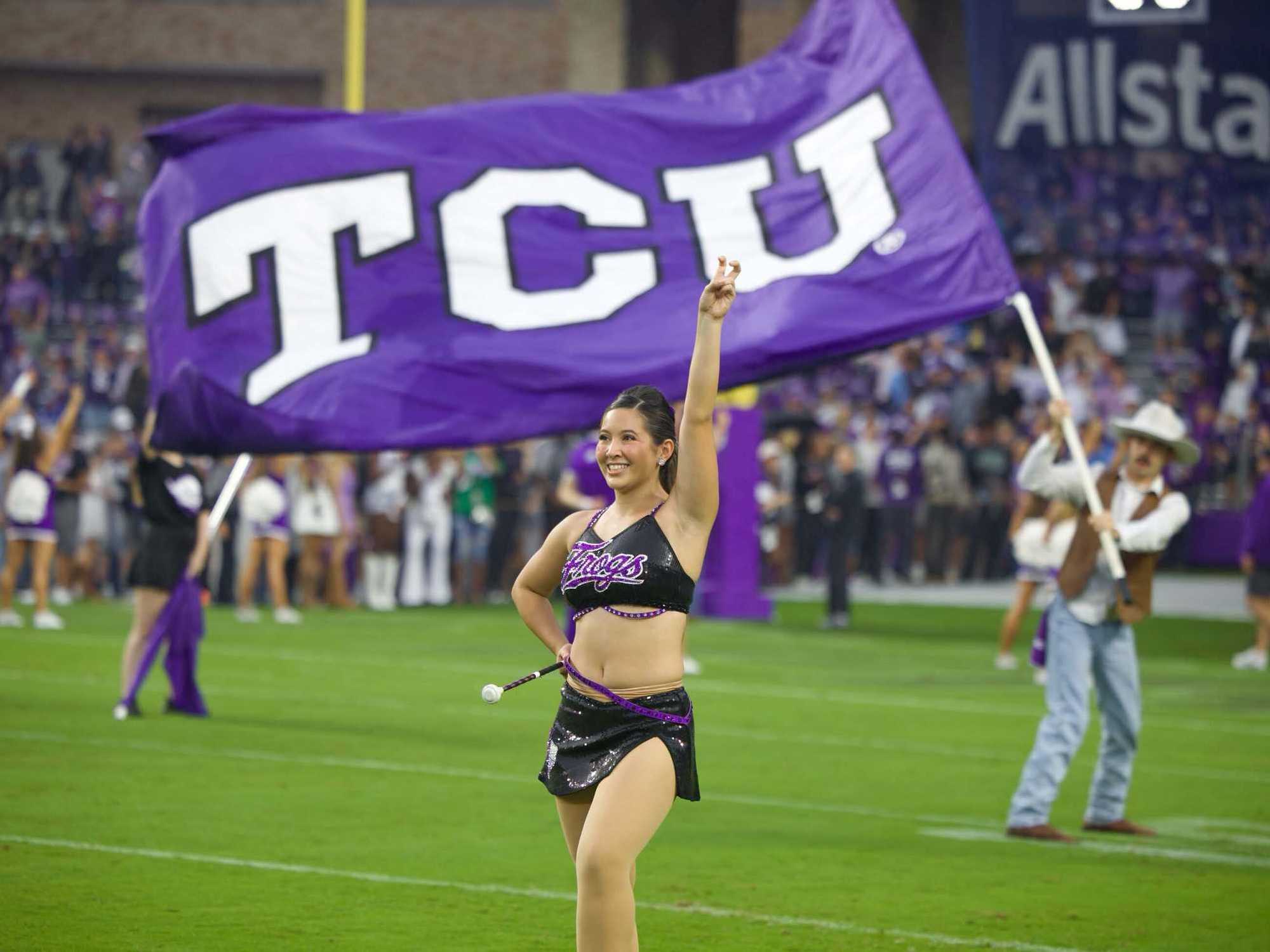 Texas Christian University cheerleader at a football game