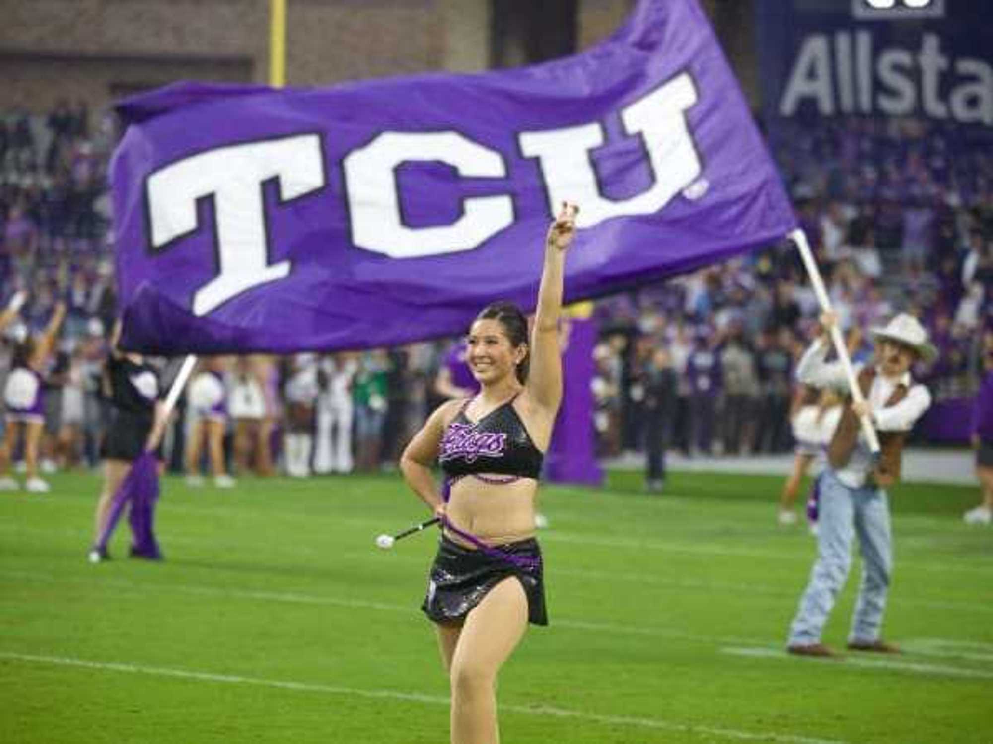 Texas Christian University cheerleader at a football game