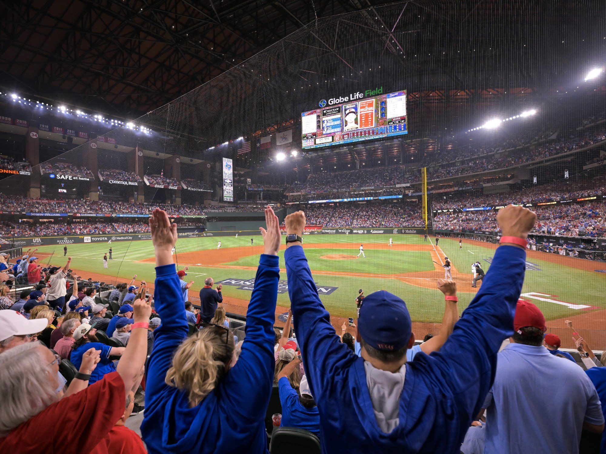 Texas Rangers fans cheering at Globe Life Field during 2023 postseason