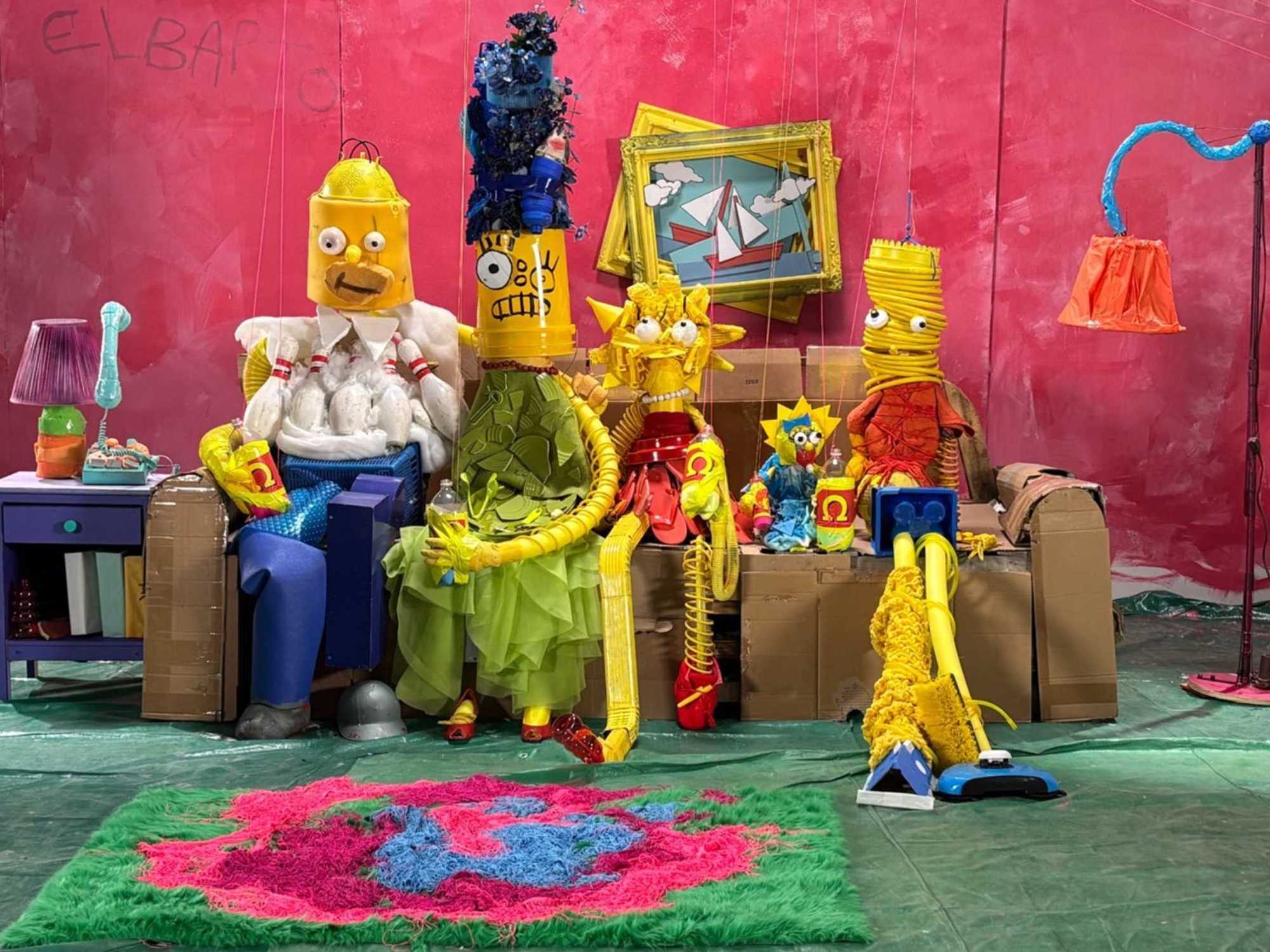 The Simpsons couch with Meow Wolf collaborative elements.