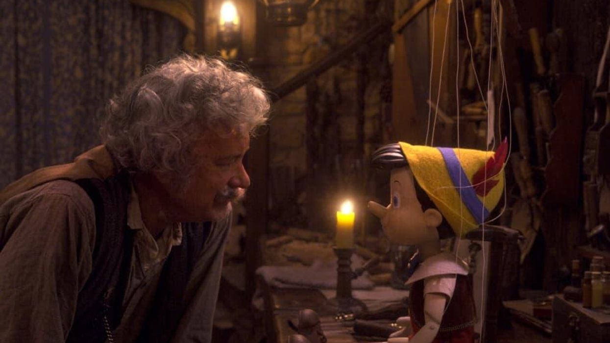 Tom Hanks and Pinocchio (Benjamin Evan Ainsworth) in Pinocchio