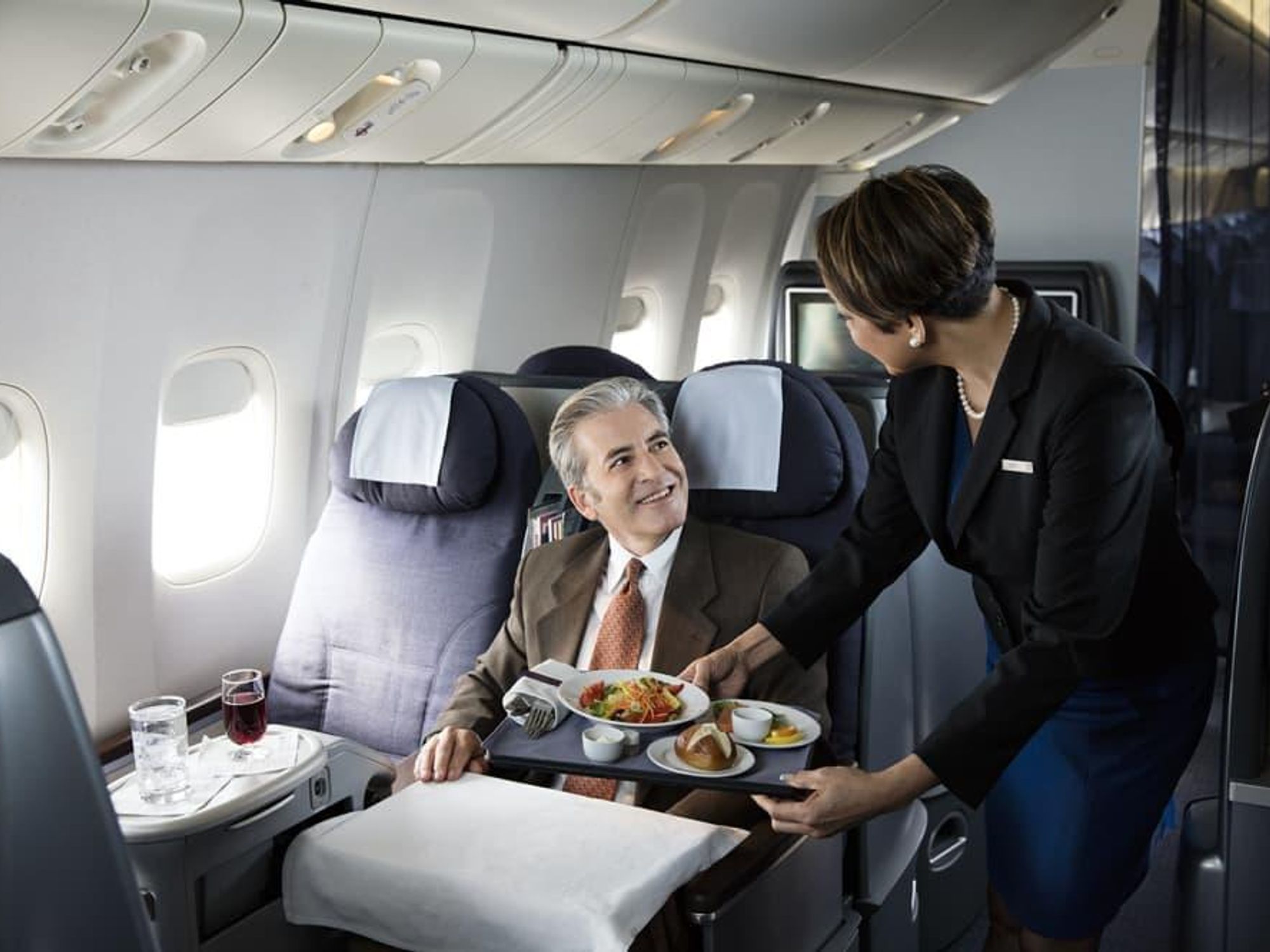 United Airlines flight attendant stewardess cabin customer