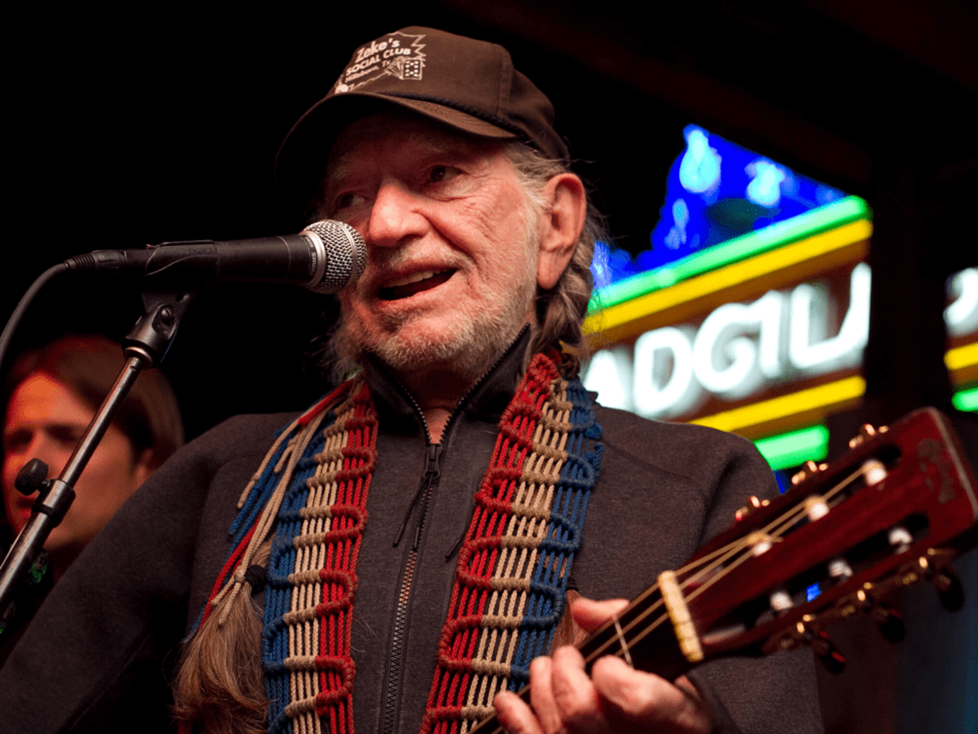 Willie Nelson performs at the Supermensch after party.