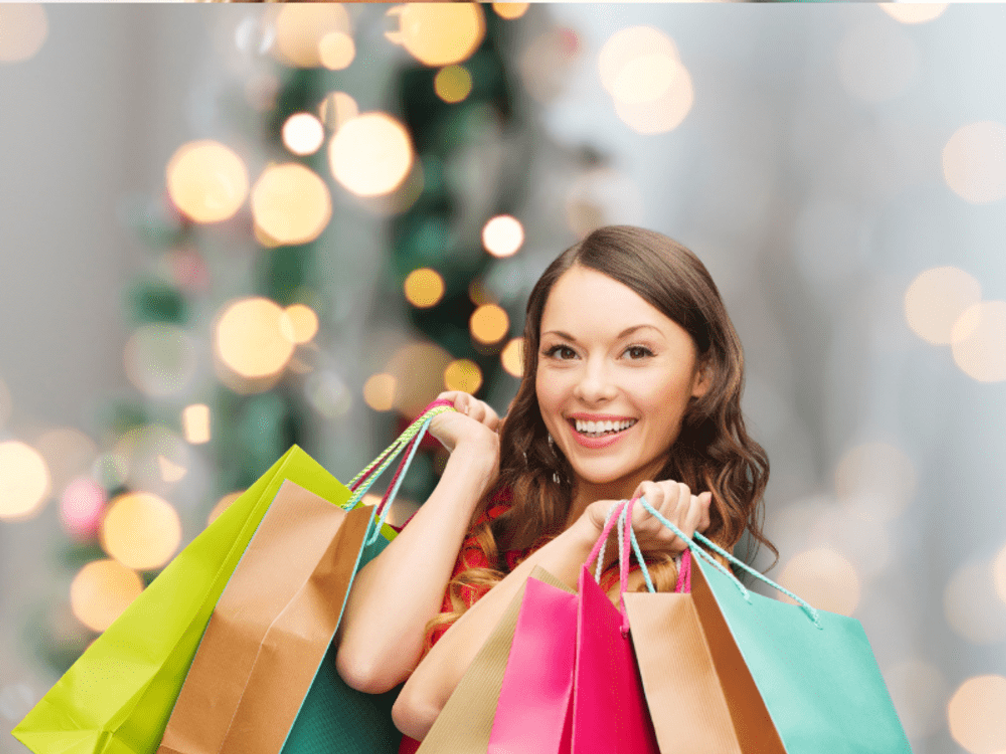 Woman holding bags, Christmas shopping
