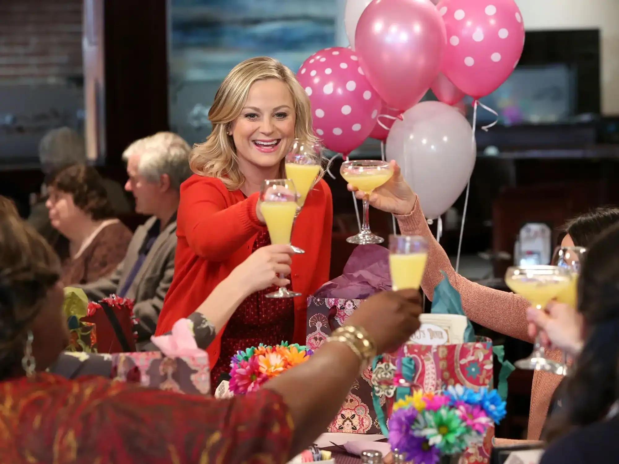 women with mimosas celebrating Galentine's Day